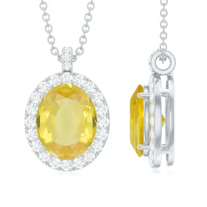 Oval Created Yellow Sapphire and Diamond Halo Pendant